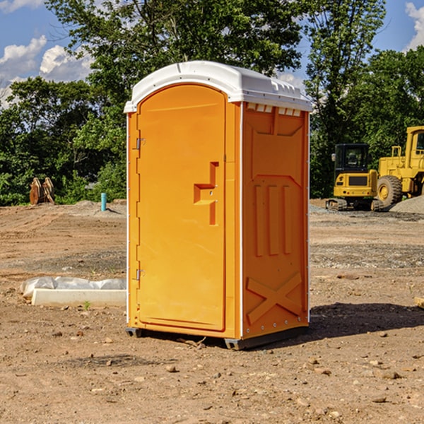 what is the cost difference between standard and deluxe portable restroom rentals in Barada